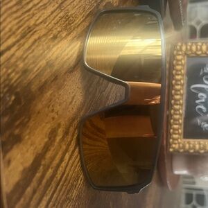 Oakley Men's Sunglasses Black Frame Brown/Gold Lenses